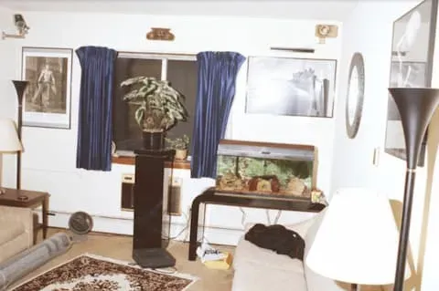 Jeffrey Dahmer's bachelor apartment 213. Notice the naked men on the wall, exotic fish tank, and security cameras on the walls.