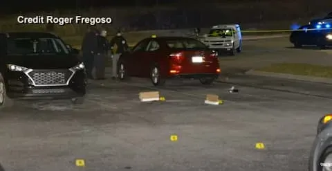 Shell casings litter the parking lot of the Urban Air Trampoline park after Timothy Wilks was shot.